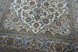 Close-up detail of 2000s Kashan rug from Iran / Persia showing Wool weave
