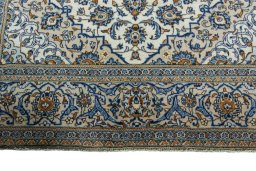 Full view of 2000s Kashan rug from Iran / Persia, 294 × 200 cm in Beige tones