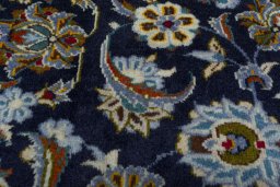 Central medallion detail of 2000s Kashan rug from Iran / Persia