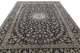 Surface texture of 2000s Kashan rug with natural Wool and intricate pattern