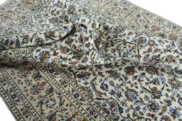 Surface texture of 2000s Kashan rug with natural Wool and intricate pattern