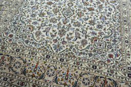 Close-up detail of 2000s Kashan rug from Iran / Persia showing Wool weave