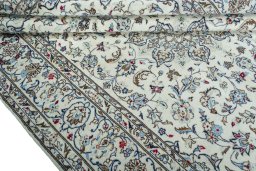 Close-up detail of 2000s Kashan rug from Iran / Persia showing Wool weave