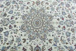 Central medallion detail of 2000s Kashan rug from Iran / Persia