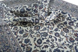 Surface texture of 2000s Kashan rug with natural Wool and intricate pattern
