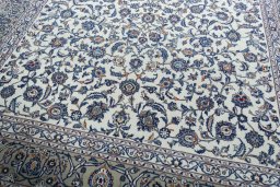 Close-up detail of 2000s Kashan rug from Iran / Persia showing Wool weave