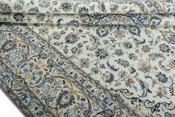 Close-up detail of 2000s Kashan rug from Iran / Persia showing Wool weave