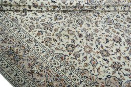 Close-up detail of 2000s Kashan rug from Iran / Persia showing Wool weave