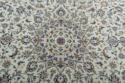 Central medallion detail of 2000s Kashan rug from Iran / Persia
