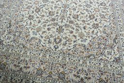 Close-up detail of 2000s Kashan rug from Iran / Persia showing Wool weave