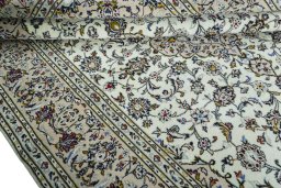 Close-up detail of 2000s Kashan rug from Iran / Persia showing Wool weave