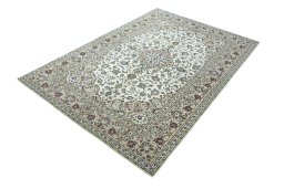 Corner detail of 2000s Kashan rug showing border pattern and Wool pile