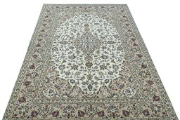 Surface texture of 2000s Kashan rug with natural Wool and intricate pattern