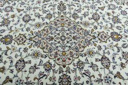 Central medallion detail of 2000s Kashan rug from Iran / Persia