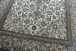 Close-up detail of 2000s Kashan rug from Iran / Persia showing Wool weave