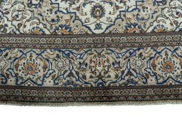 Full view of 2000s Kashan rug from Iran / Persia, 315 × 200 cm in Beige tones