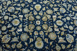Central medallion detail of 2000s Kashan rug from Iran / Persia