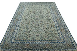 Surface texture of 2000s Kashan rug with natural Wool and intricate pattern