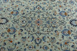 Central medallion detail of 2000s Kashan rug from Iran / Persia