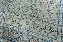 Close-up detail of 2000s Kashan rug from Iran / Persia showing Wool weave