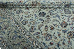 Close-up detail of 2000s Kashan rug from Iran / Persia showing Wool weave