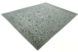Corner detail of 2000s Kashan rug showing border pattern and Wool pile