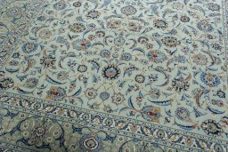 Close-up detail of 2000s Kashan rug from Iran / Persia showing Wool weave