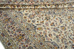 Close-up detail of 2000s Kashan rug from Iran / Persia showing Wool weave