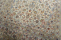 Close-up detail of 2000s Kashan rug from Iran / Persia showing Wool weave