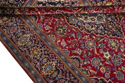 Close-up detail of 2000s Kashan rug from Iran / Persia showing Wool weave