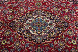 Central medallion detail of 2000s Kashan rug from Iran / Persia