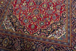 Close-up detail of 2000s Kashan rug from Iran / Persia showing Wool weave