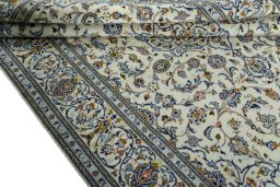 Close-up detail of New Kashan rug from Iran / Persia showing Wool weave