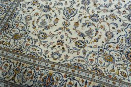 Close-up detail of New Kashan rug from Iran / Persia showing Wool weave