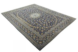 Close-up detail of 2000s Kashan rug from Iran / Persia showing Wool weave