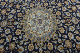 Central medallion detail of 2000s Kashan rug from Iran / Persia