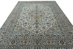 Surface texture of 2000s Kashan rug with natural Wool and intricate pattern