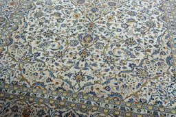 Close-up detail of 2000s Kashan rug from Iran / Persia showing Wool weave