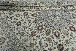 Close-up detail of 2000s Kashan rug from Iran / Persia showing Wool weave
