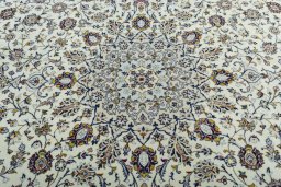 Central medallion detail of 2000s Kashan rug from Iran / Persia