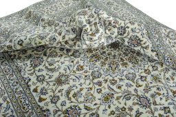 Surface texture of 2000s Kashan rug with natural Wool and intricate pattern