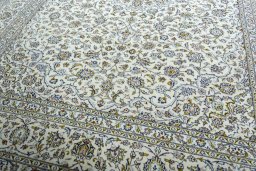 Close-up detail of 2000s Kashan rug from Iran / Persia showing Wool weave