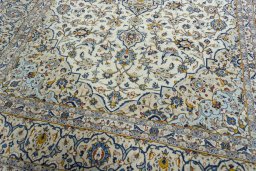 Close-up detail of 2000s Kashan rug from Iran / Persia showing Wool weave