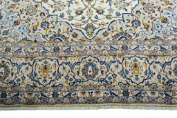 Full view of 2000s Kashan rug from Iran / Persia, 360 × 247 cm in Beige tones