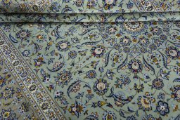 Close-up detail of 2000s Kashan rug from Iran / Persia showing Wool weave