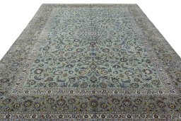 Surface texture of 2000s Kashan rug with natural Wool and intricate pattern