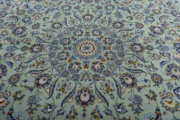 Central medallion detail of 2000s Kashan rug from Iran / Persia