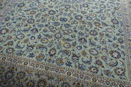 Close-up detail of 2000s Kashan rug from Iran / Persia showing Wool weave