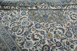 Close-up detail of 2000s Kashan rug from Iran / Persia showing Wool weave
