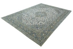 Corner detail of 2000s Kashan rug showing border pattern and Wool pile